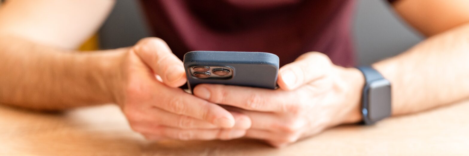 Man using iPhone 13